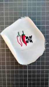 broderie piments rouges